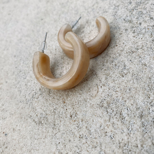 Marble stone half hoop pierces.