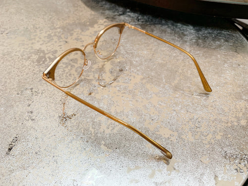 Half frame brown glasses